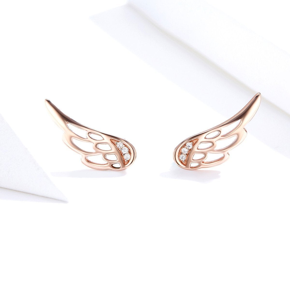 Rose gold wing earrings