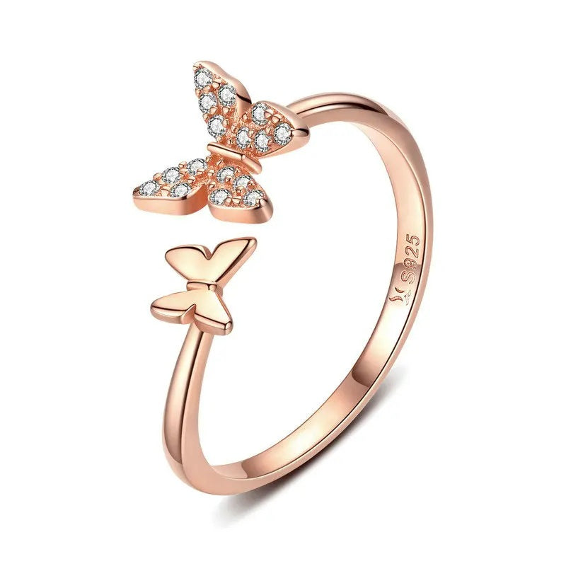 rose gold butterfly ring with gemstones