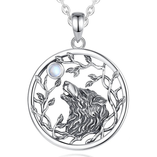 Silver howling wolf pendant.