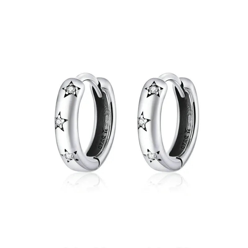 Star huggie hoops in silver